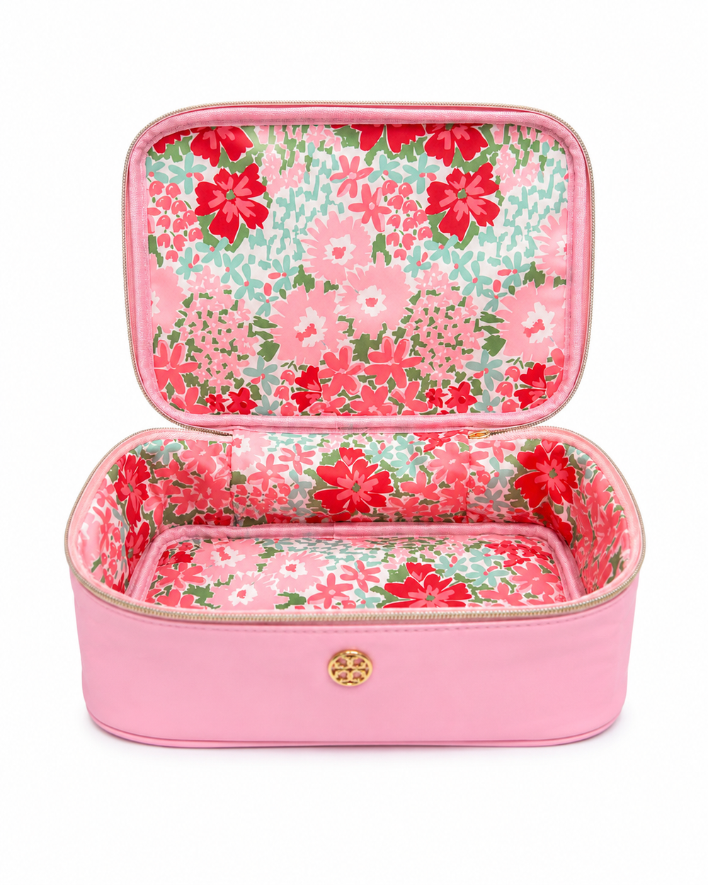 Open pink cosmetic travel case featuring a colorful floral interior, spacious storage compartment, and gold zipper closure for makeup and travel essentials.