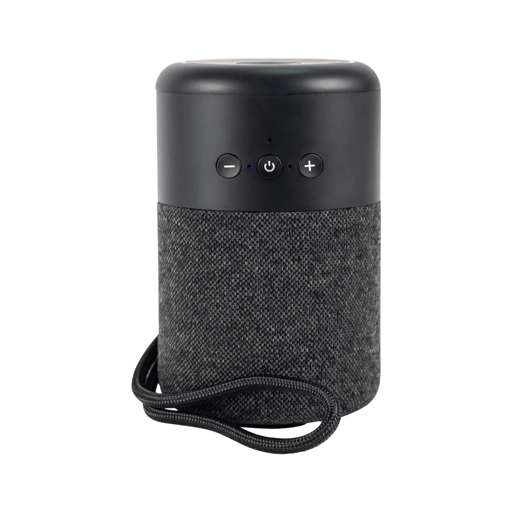 Black portable speaker with textured finish and control buttons on a white background