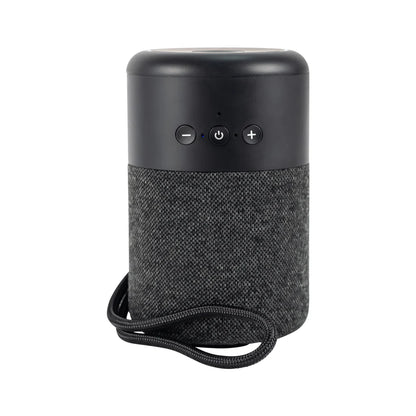 Black portable speaker with textured finish and control buttons on a white background