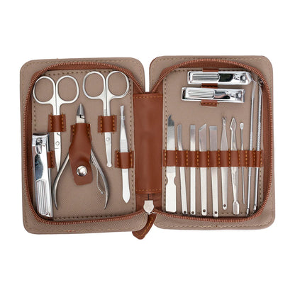 Manicure set with tools in a brown case on a white background