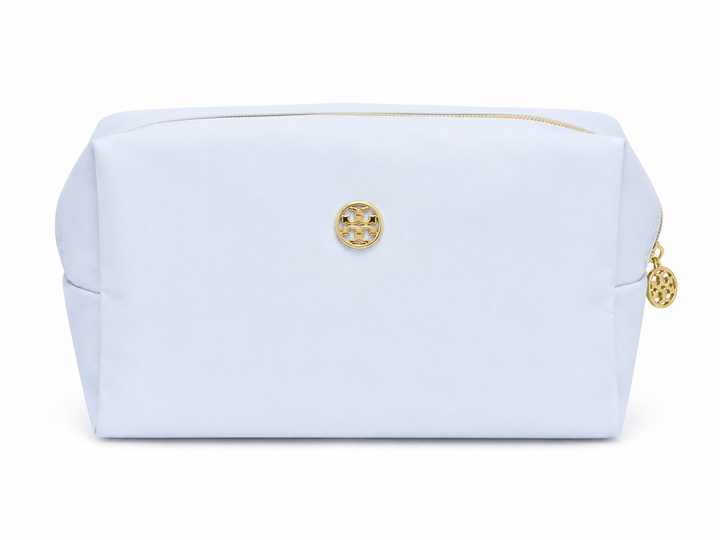 Light blue cosmetic bag with gold zipper and gold emblem, spacious travel makeup pouch for cosmetics, skincare, toiletries, and everyday beauty essentials.