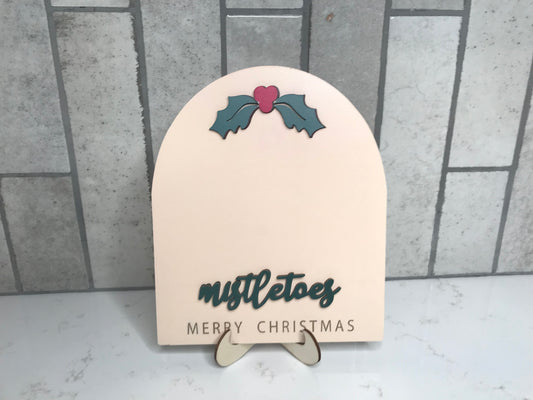 Neutral wood Mistletoes sign with holly detail and stand for baby first Christmas footprint