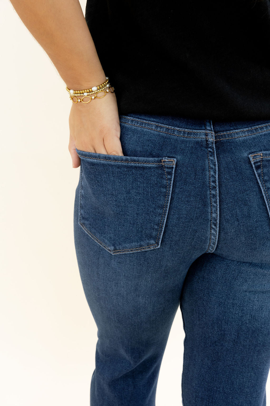 Dear John Jeanne Flare Jean in Richmond close-up showing back pocket stitching and dark indigo denim