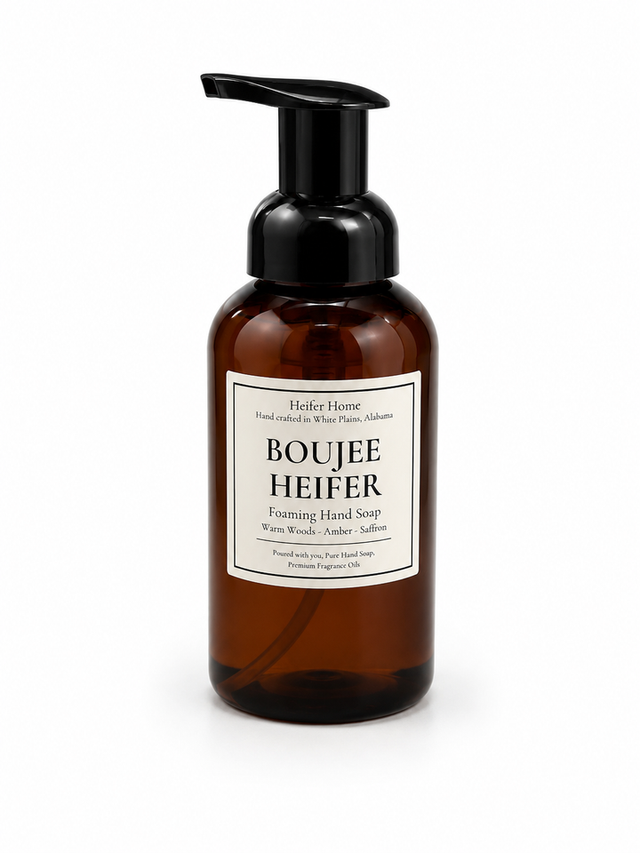 Heifer Home Boujee Heifer foaming hand soap in an amber pump bottle infused with warm woods, amber, and saffron for a luxurious handwashing experience.