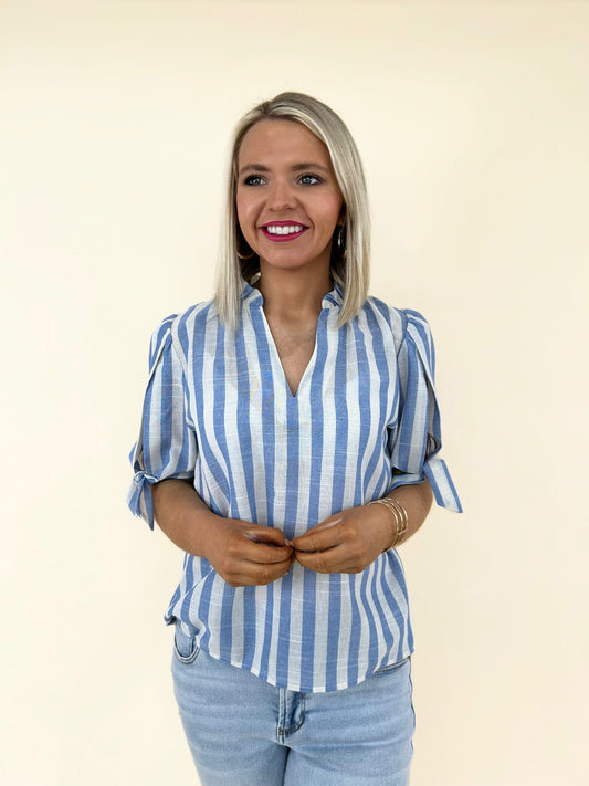 THML women’s blue striped top with v-neckline and puff sleeve detail