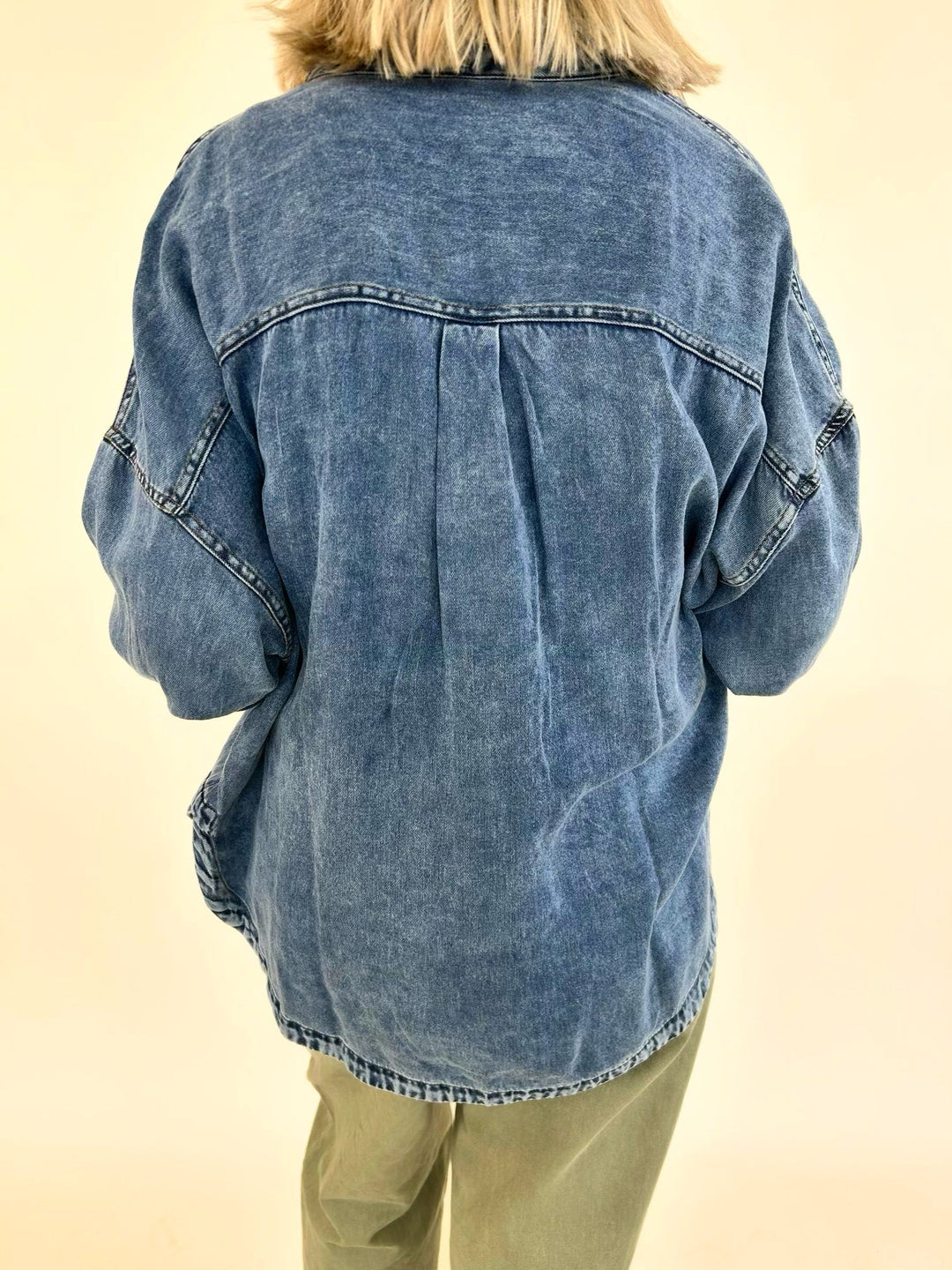 Back view of Marlow Mineral Wash Denim Shirt on model showcasing oversized fit and lightweight drape