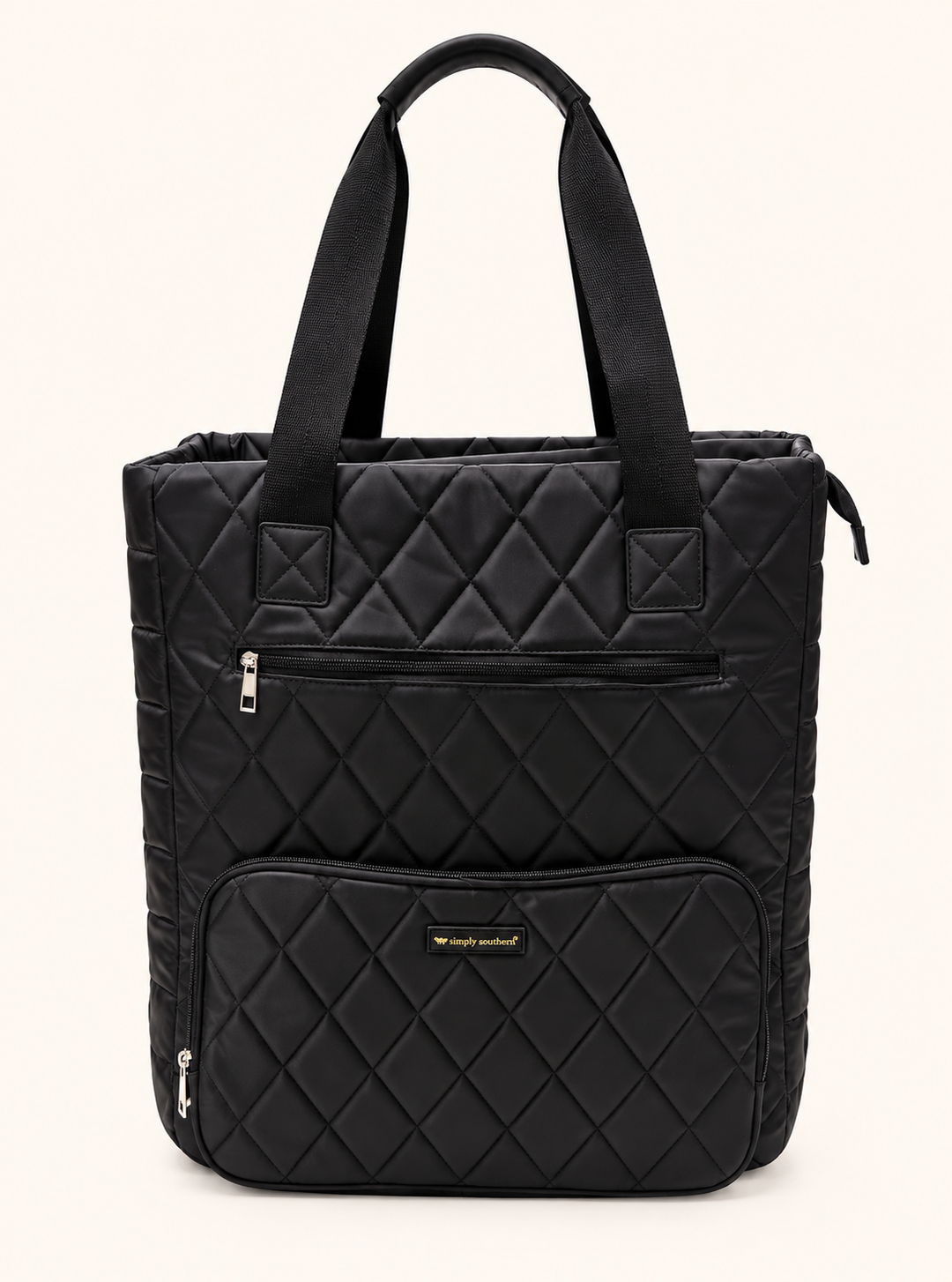 Simply Southern black diamond quilted travel tote with padded carrying straps, spacious upright design, and two front zippered storage pockets.