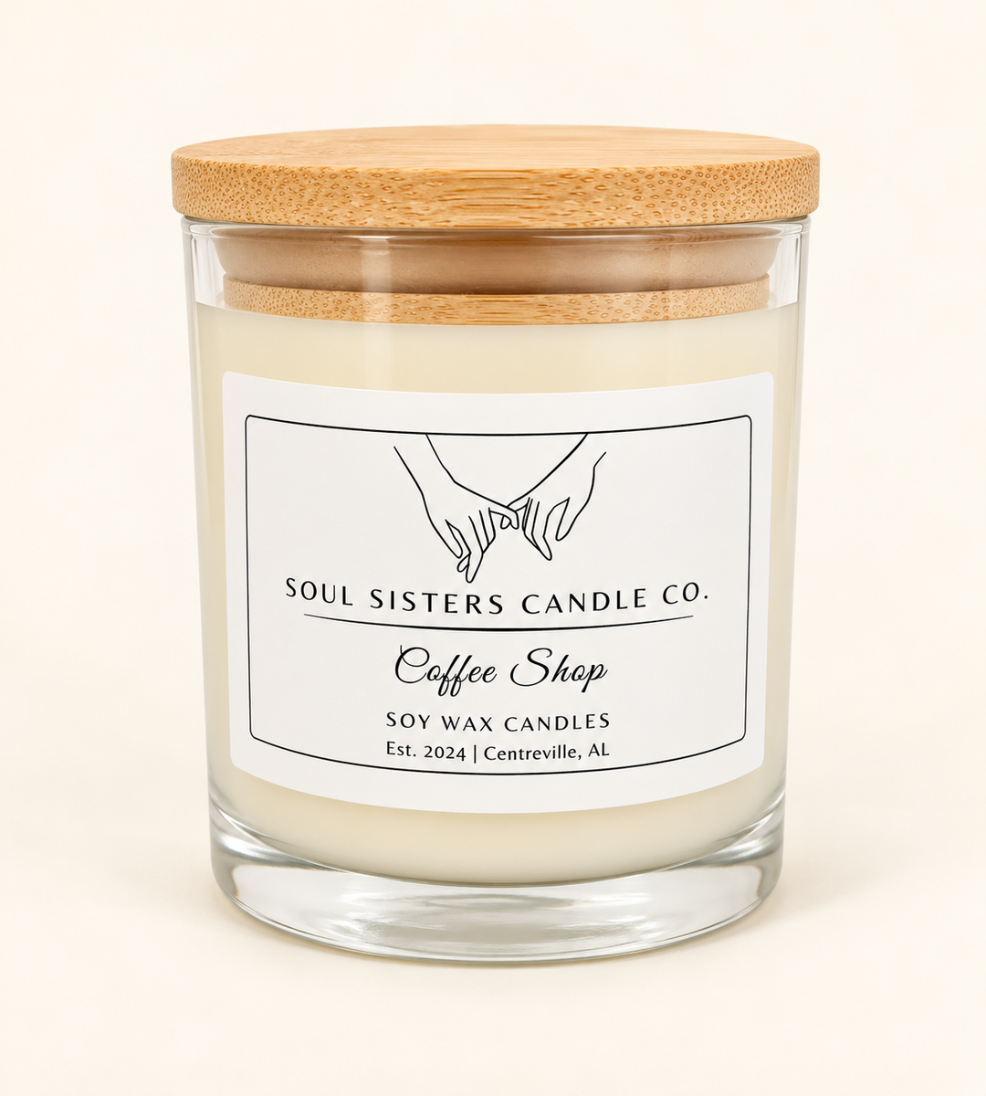 Soul Sisters Candle Co. Coffee Shop soy wax candle in a clear glass jar with natural wood lid, featuring a rich coffee, caramel, and vanilla fragrance.