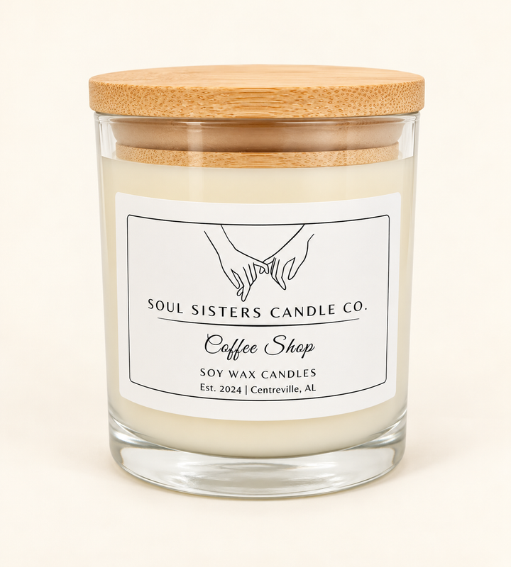 Soul Sisters Candle Co. Coffee Shop soy wax candle in a clear glass jar with natural wood lid, featuring a rich coffee, caramel, and vanilla fragrance.