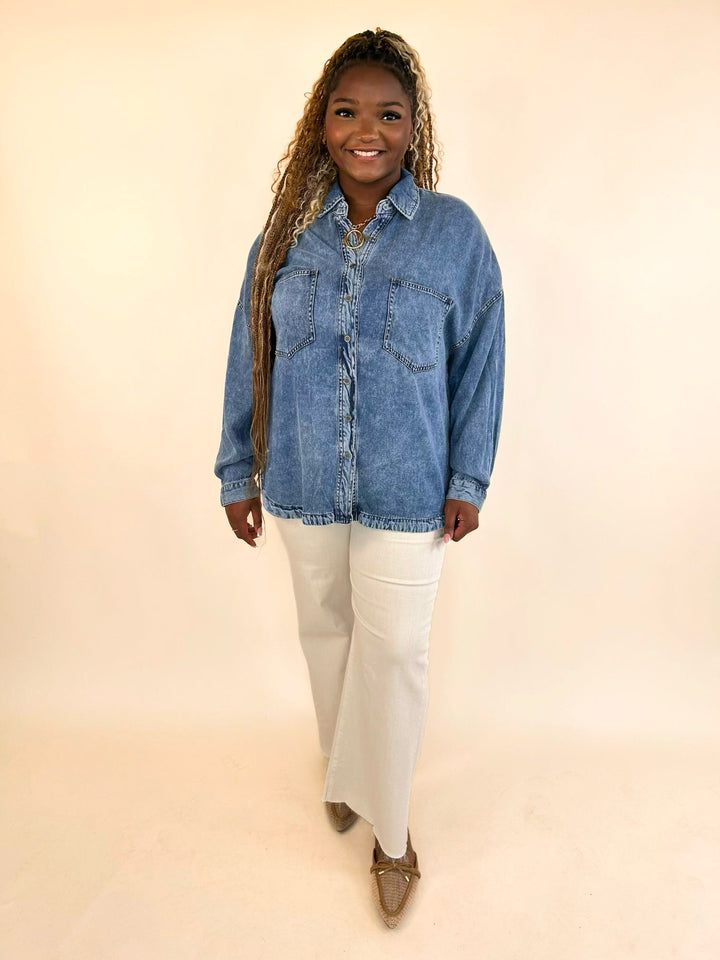 Front view of Marlow Mineral Wash Denim Shirt styled with cream pants and neutral accessories