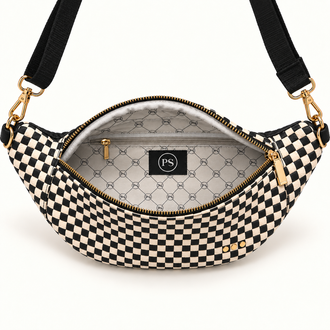 Open Checkered Black Woven Susie Bum Bag showing interior pockets and patterned lining.