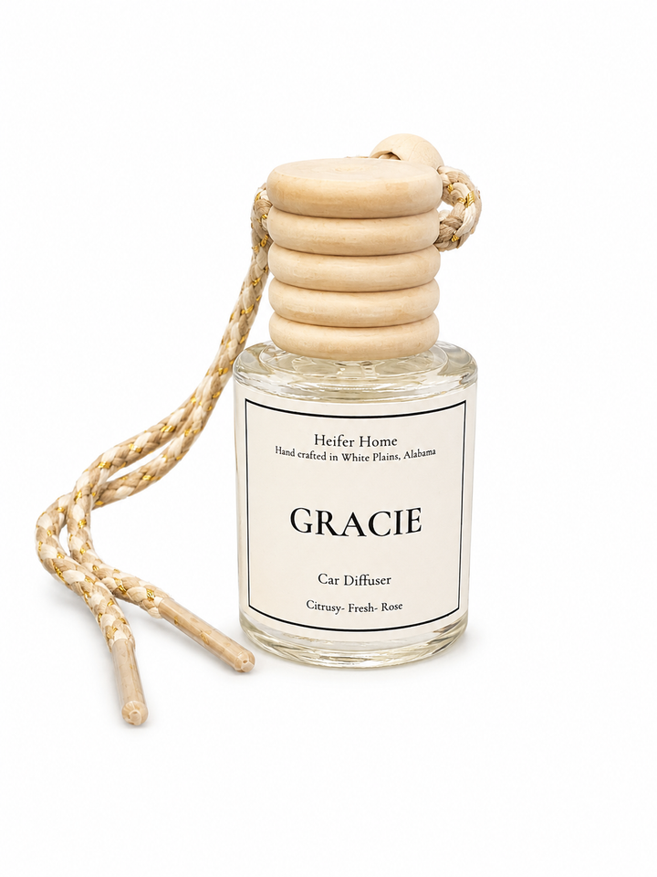 Heifer Home Gracie refillable car diffuser featuring a fresh citrus and rose fragrance.