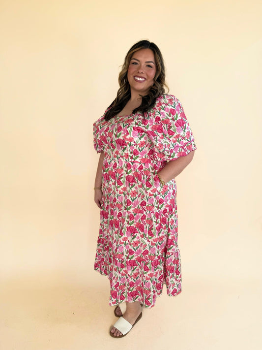Jasmine floral tulip sleeve dress in pink floral print with puff sleeves and tiered midi skirt, plus-size boutique dress.