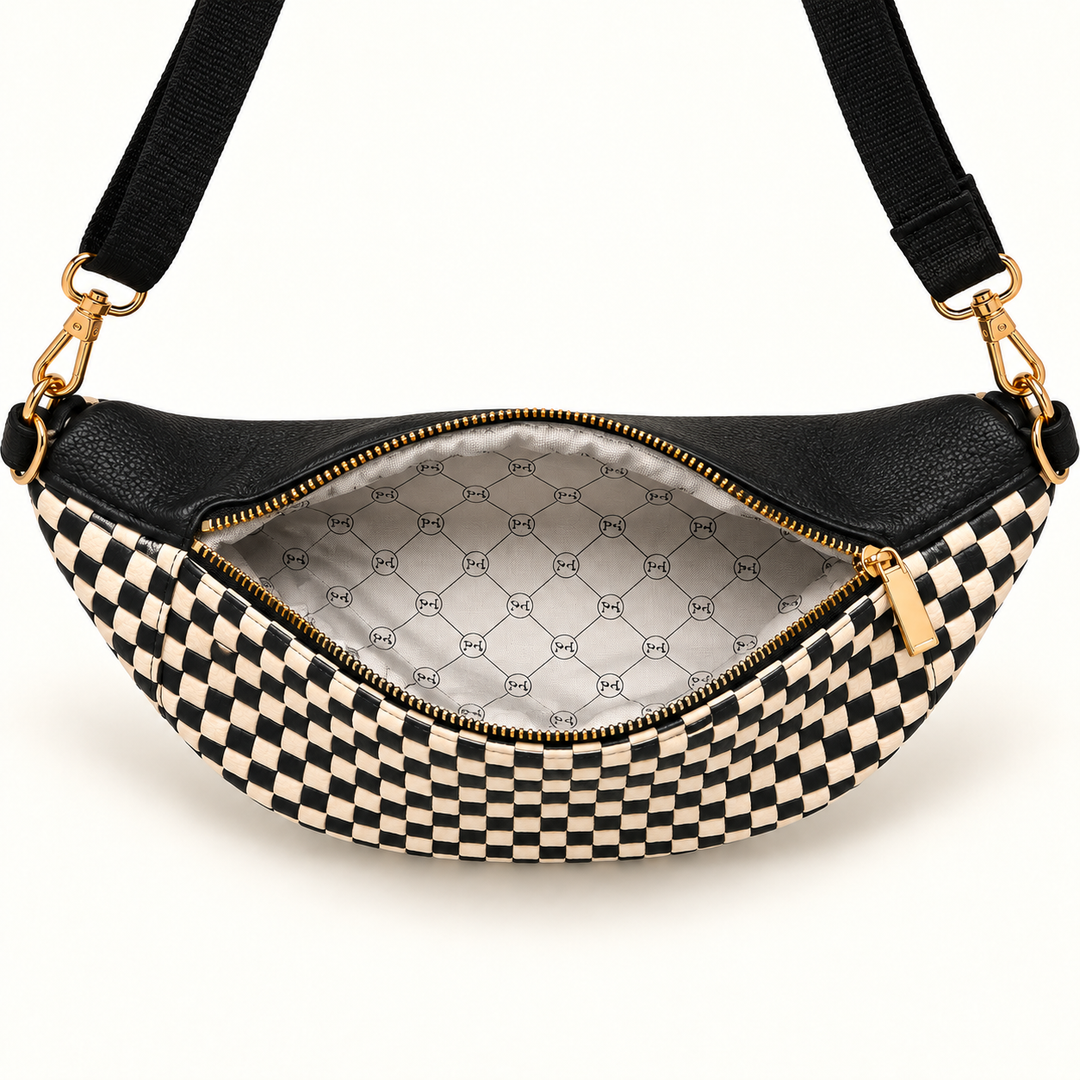 Interior view of the Checkered Black Woven Susie Sidekick Bum Bag with organizational compartments.