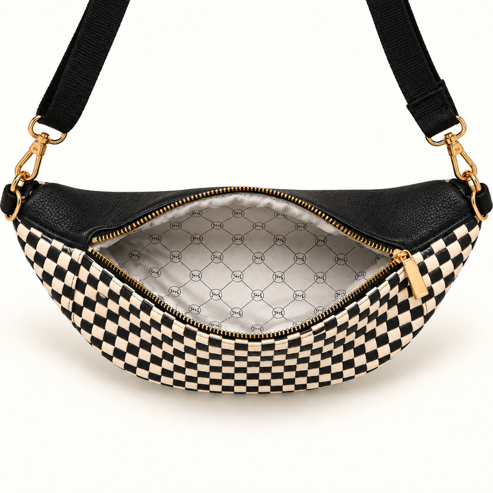 Interior view of the Checkered Black Woven Susie Sidekick Bum Bag with organizational compartments.