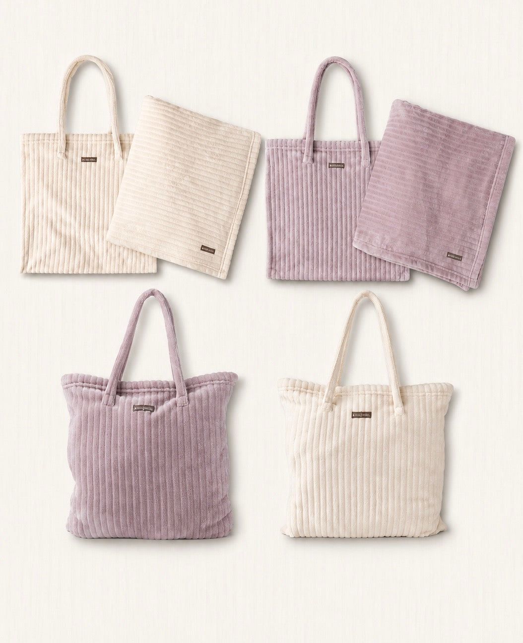 Hello Mello On My Way tote blanket collection featuring blush and ivory ribbed microfiber blankets with matching tote bags