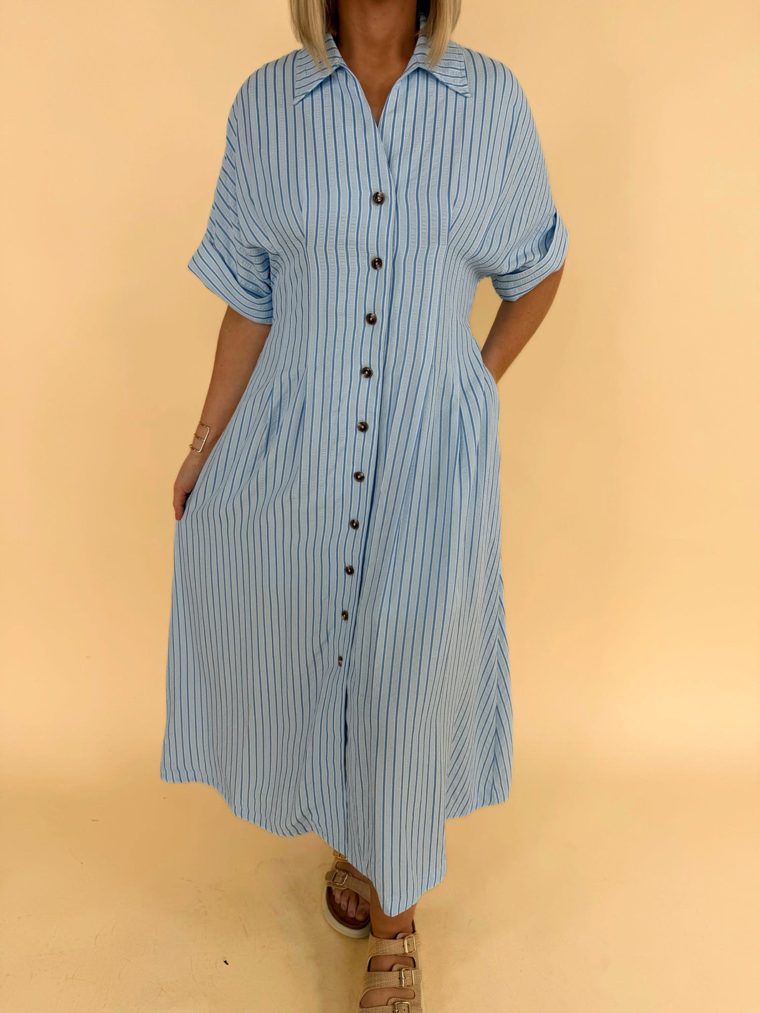 Light blue striped button front midi dress with short sleeves women’s boutique spring dress