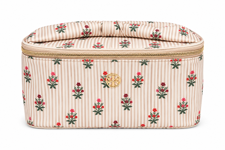 Beige striped floral travel cosmetic case with red flower print, top carry handle, gold zipper, and spacious makeup storage for travel and everyday organization.