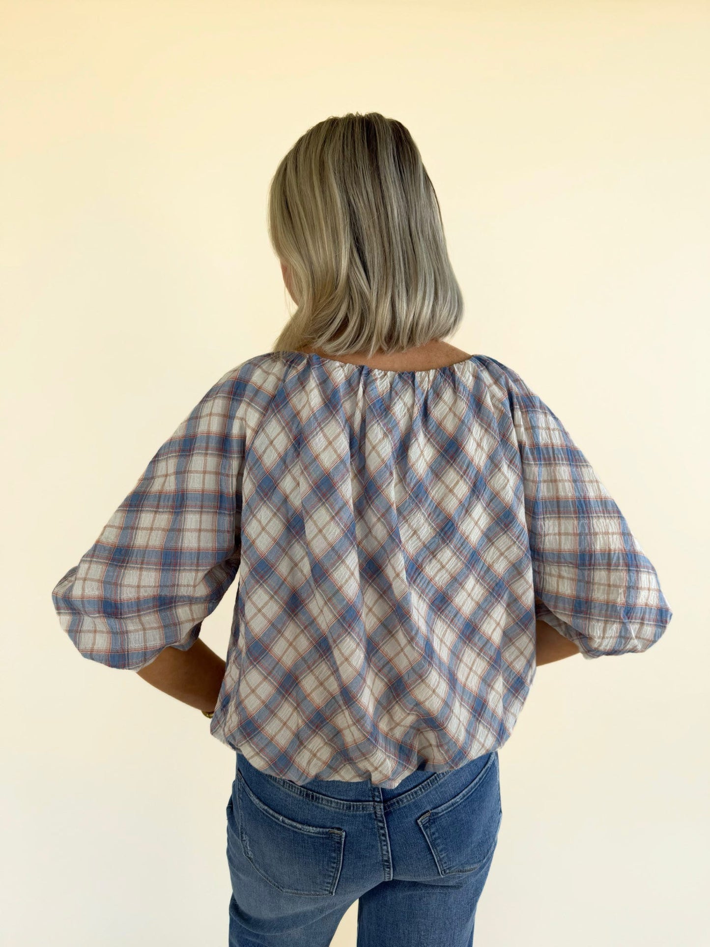 women’s plaid blouse blue and cream short sleeve loose fit gathered neckline casual spring summer top back view