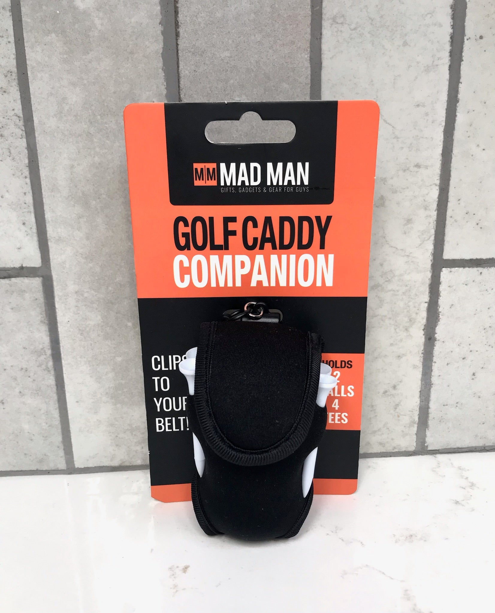 Golf caddy companion clip on packaging with 'Mad Man' branding.