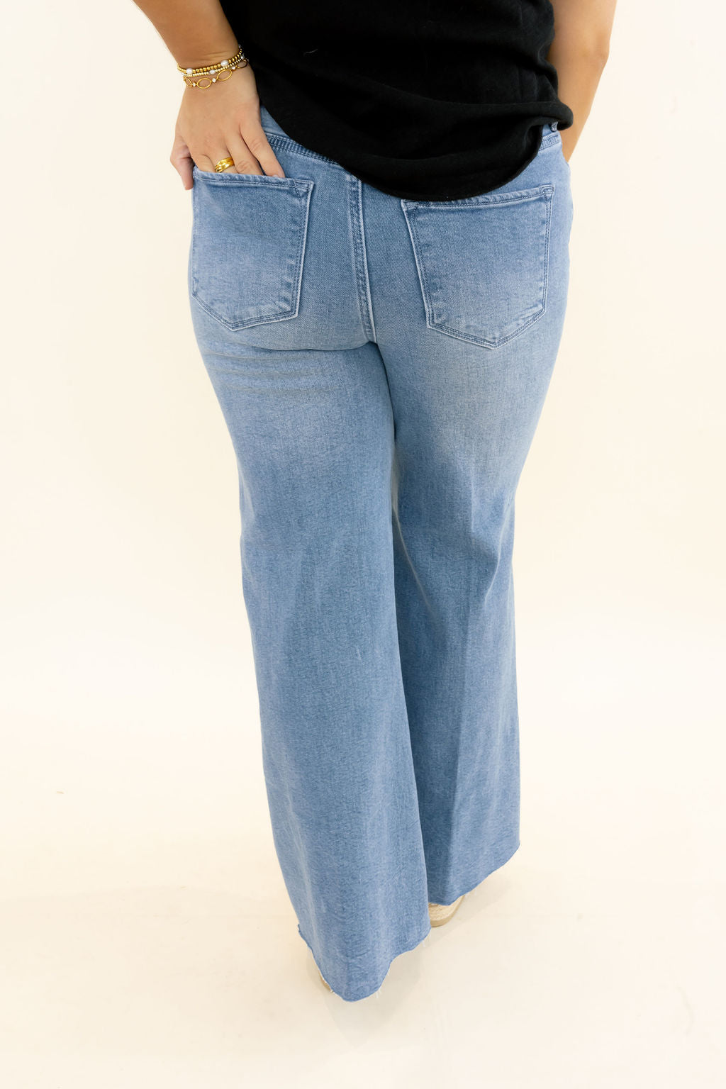 Dear John Bowie Wide Leg Jeans in Poetry showing light wash denim, back pockets and wide-leg silhouette