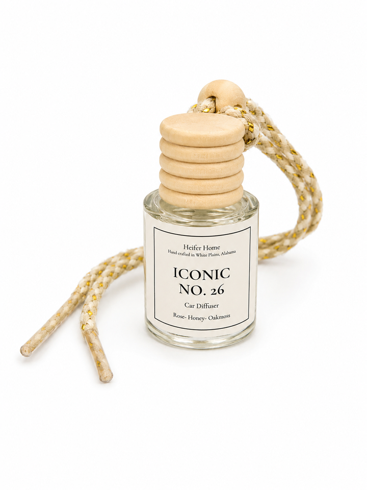 Heifer Home Iconic No. 26 refillable car diffuser featuring a rose, honey, and oakmoss fragrance.