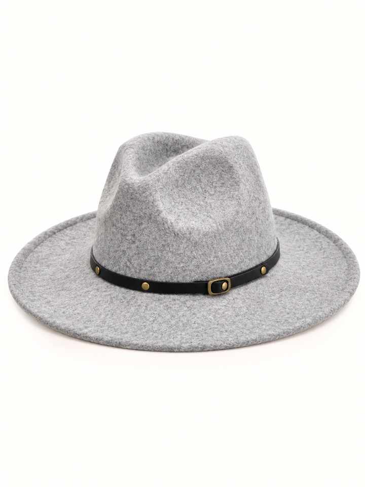 Light gray wide brim felt western fedora hat featuring a structured pinched crown, heathered wool blend texture, and black hat band with antique gold buckle on a cream background.