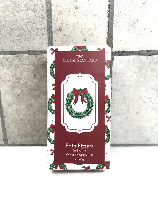 Packaging of Royal Standard Bath Fizzers with a wreath design on a tiled background