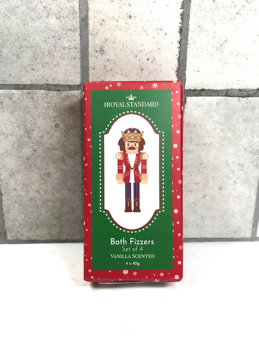 Pack of Royal Standard Bath Fixers with a nutcracker design on a gray tiled background