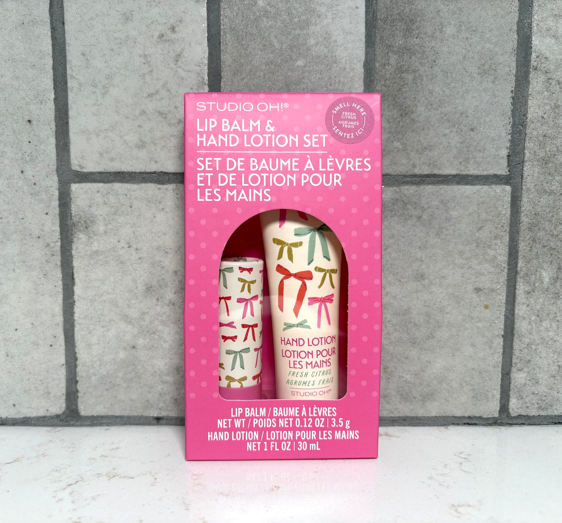 Studio Oh bow print lip balm and hand lotion gift set, fresh citrus scented boutique beauty gift from Square 1 Boutique Alabama