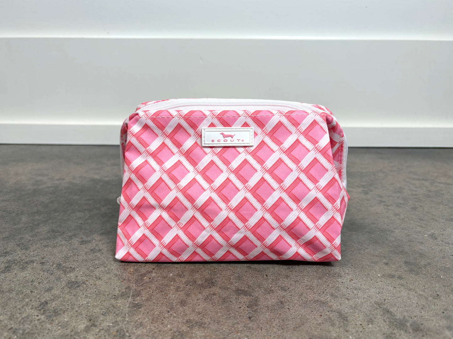 Little Mouth Makeup Bag in Garden Gate pink and white lattice print, compact zippered cosmetic pouch for everyday essentials.