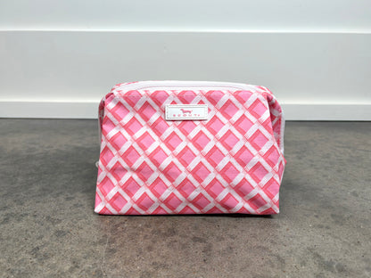 Little Mouth Makeup Bag in Garden Gate pink and white lattice print, compact zippered cosmetic pouch for everyday essentials.