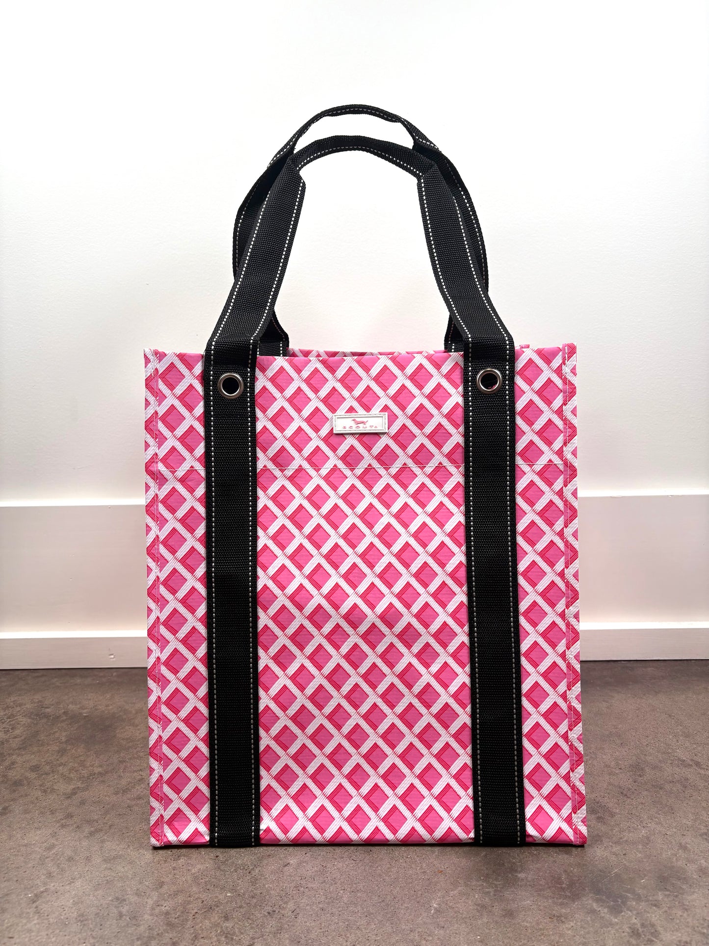 Angled view of Bagette Market Tote Bag in Stripe a Pose multicolor stripe print, durable market tote with reinforced handles.