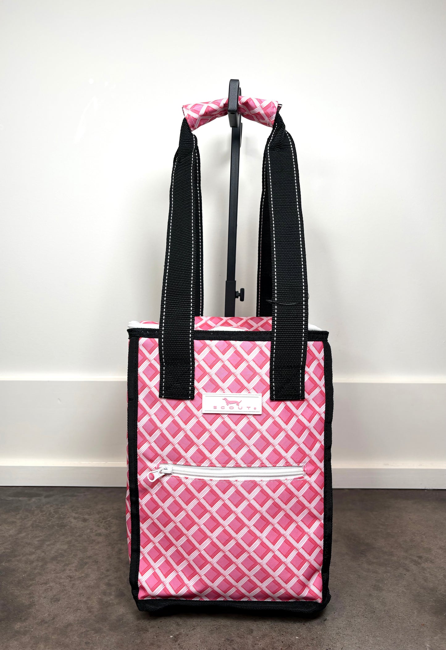 Pleasure Chest Cooler in Garden Gate pink and white lattice print, insulated soft cooler with zippered lid and black carry handles.