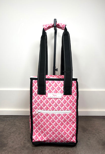 Pleasure Chest Cooler in Garden Gate pink and white lattice print, insulated soft cooler with zippered lid and black carry handles.