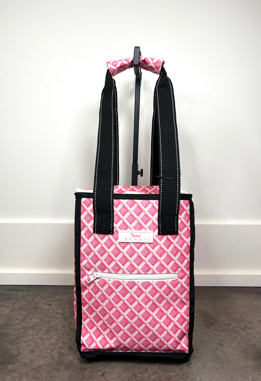 Pleasure Chest Cooler in Garden Gate pink and white lattice print, insulated soft cooler with zippered lid and black carry handles.