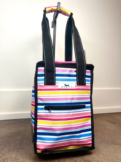 Side view of Pleasure Chest Cooler in Stripe a Pose multicolor stripe print, structured insulated cooler bag with front zip pocket and sturdy carry straps.
