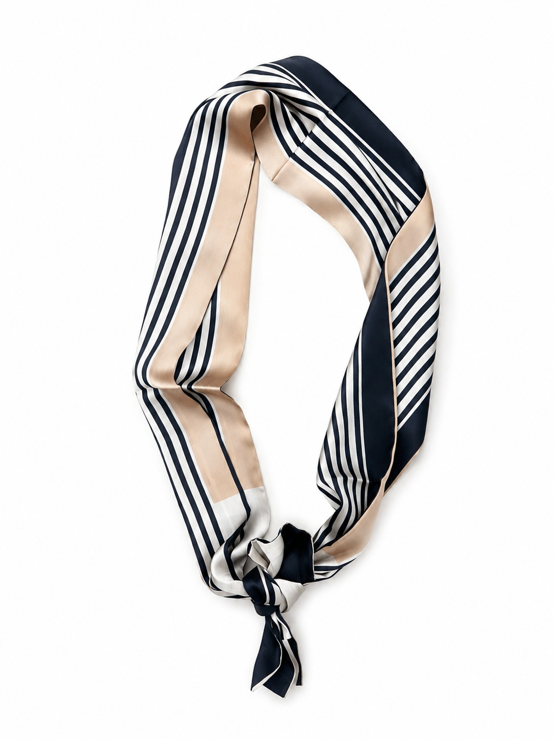 A silk scarf with a striped pattern in black, beige, and white, tied in a knot at the bottom and displayed on a clean white background.