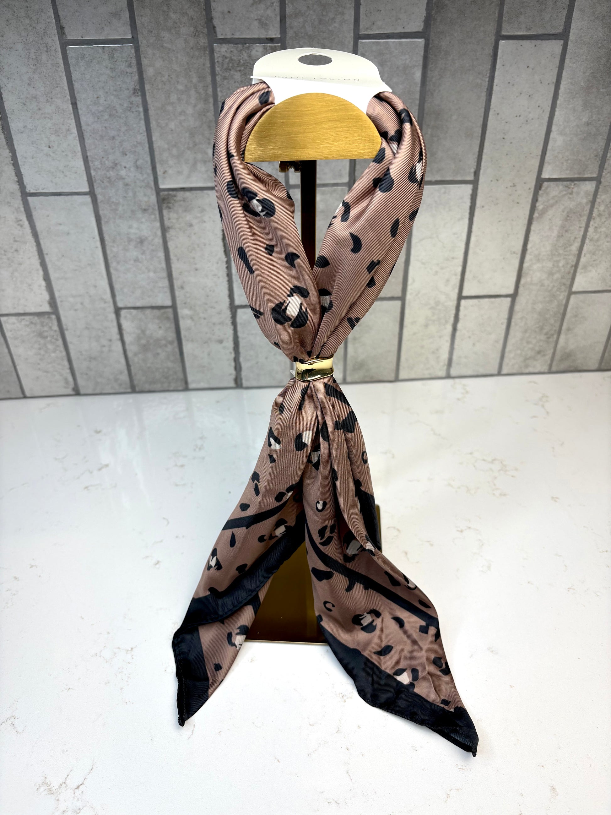 Katie Loxton Satin Multiway Scarf in mocha leopard print satin square scarf.