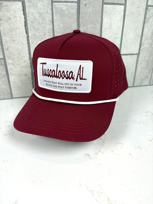 Crimson Tuscaloosa AL trucker hat with embroidered patch and rope detail