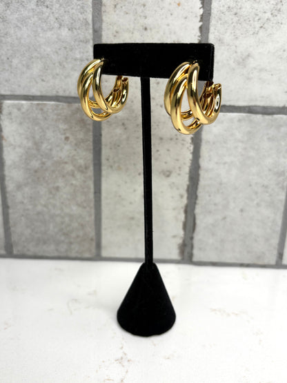 Layered gold hoop earrings with bold stacked design – stylish statement earrings for everyday wear