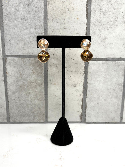 Gold double stone drop earrings with champagne and amber crystals on black display stand – elegant boutique jewelry