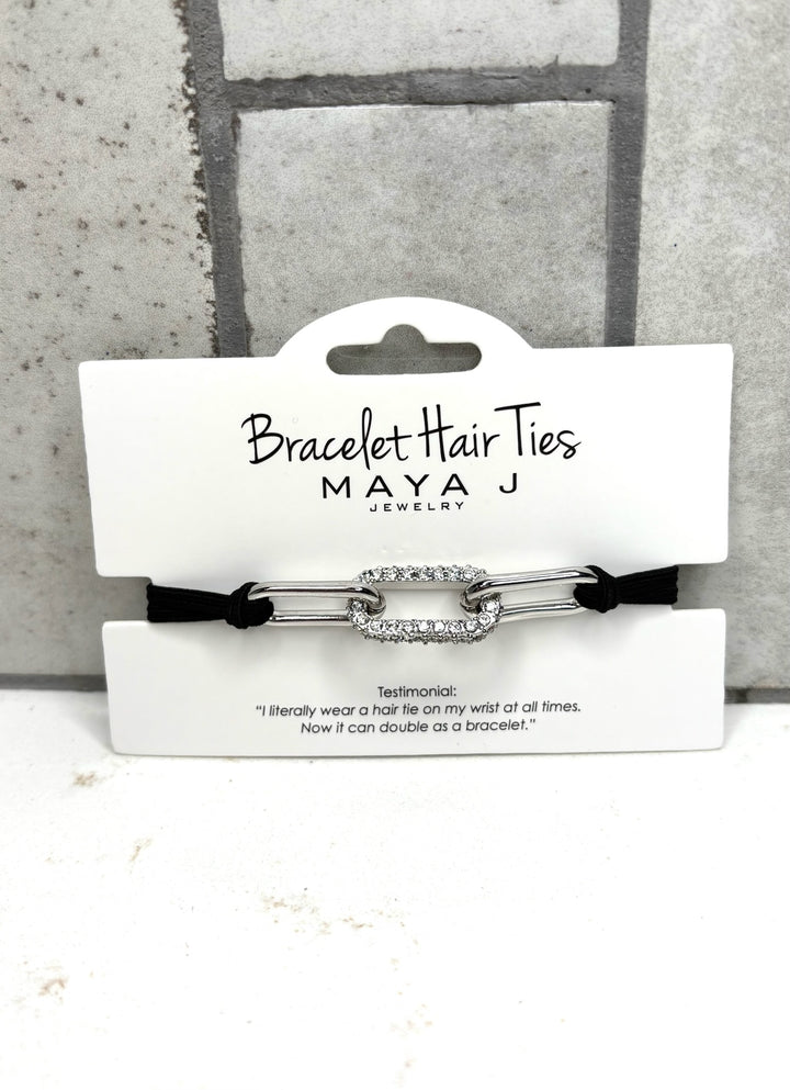 Silver rhinestone bracelet hair tie, black elastic hair tie bracelet, Maya J Jewelry accessory, crystal link hair tie, stylish wrist hair tie bracelet for women, everyday fashion accessory
