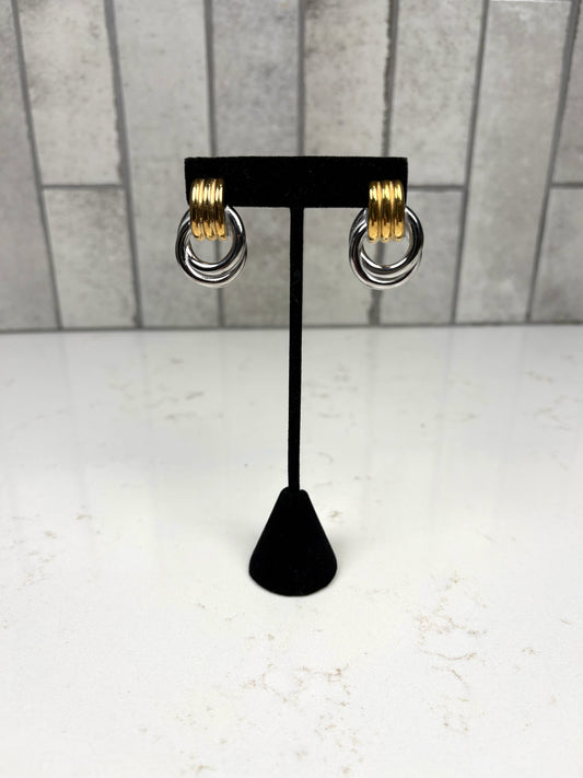 Chan Sutt Pearls Gold and silver two-tone hoop earrings with layered rings on black display stand