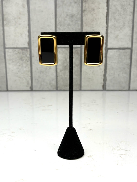 Chan Sutt Pearls Gold rectangular black statement stud earrings on display stand – bold modern jewelry