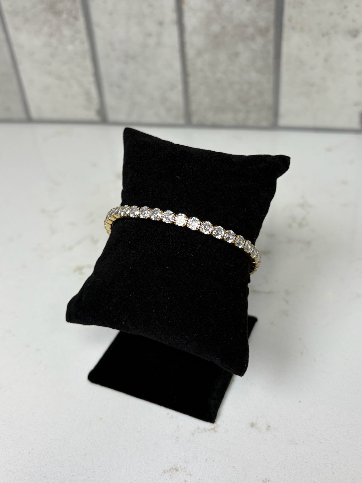 Chan Sutt Pearls gold tennis bracelet with round crystal stones close-up – stretch bracelet for women elegant jewelry