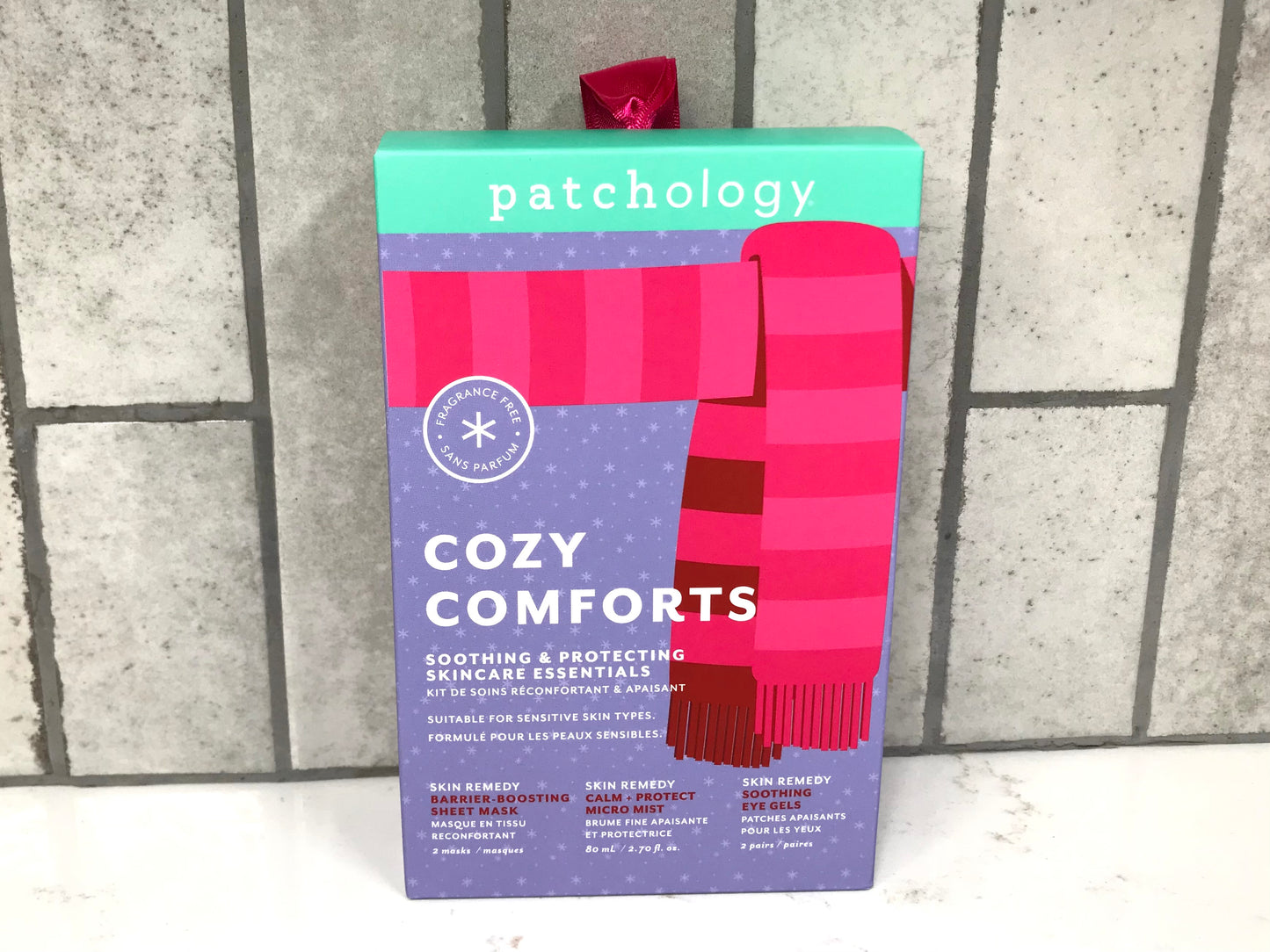 Patchology Cozy Comforts kit packaging on a tiled floor background