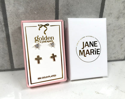 Kids 18K gold-plated stud earring set by Jane Marie, featuring crystal heart studs and small gold cross studs displayed in a pink gift box with white Jane Marie sleeve.