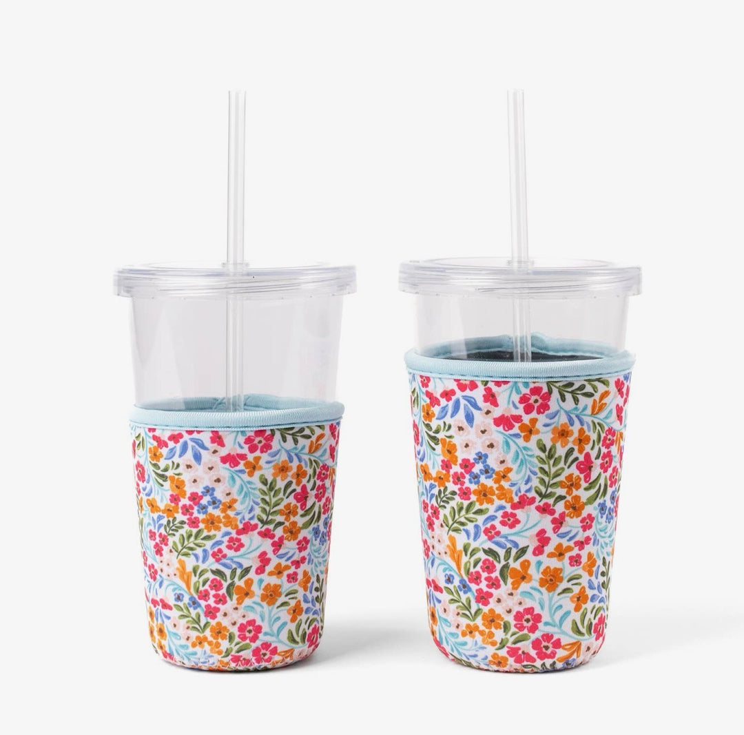 Floral Filigree reusable neoprene drink sleeve for iced coffee cups shown in regular and large sizes with colorful floral print.