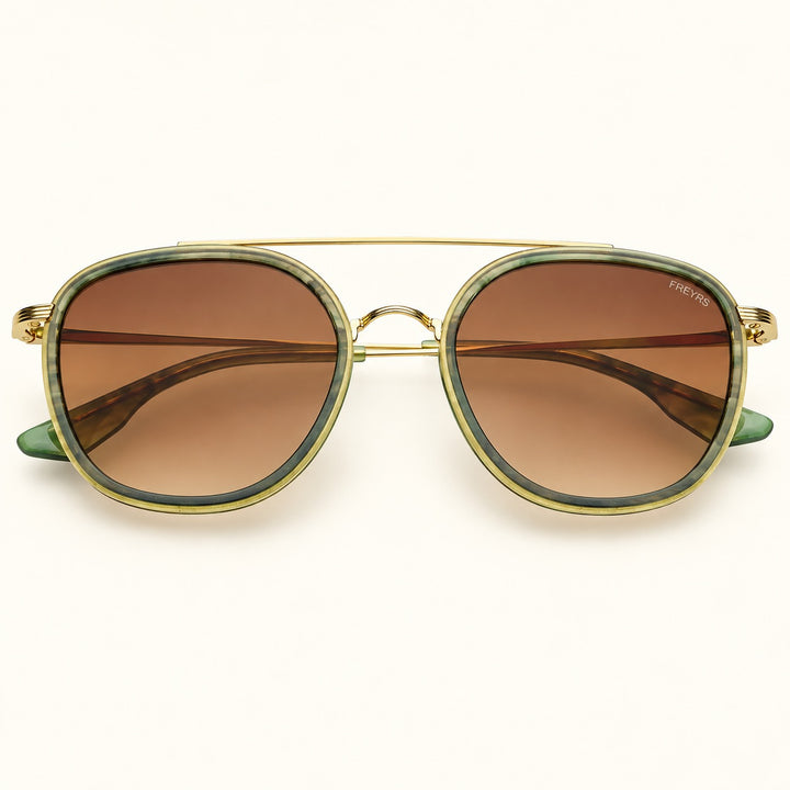 Front view of FREYRS Weston unisex round sunglasses in Emerald featuring green acetate frames, brown gradient lenses, and a gold-tone double bridge.